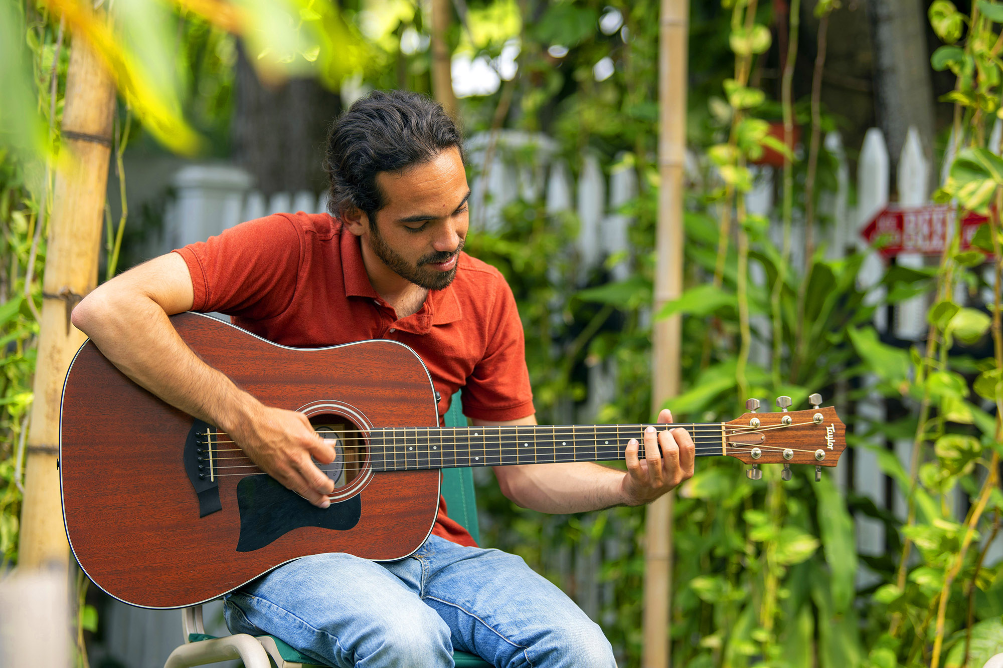 young man playing guitar